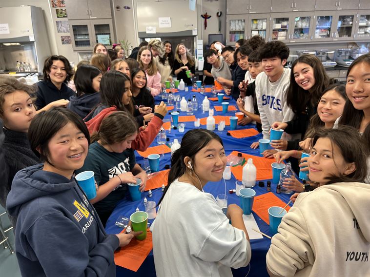 Students making slime for Halloween